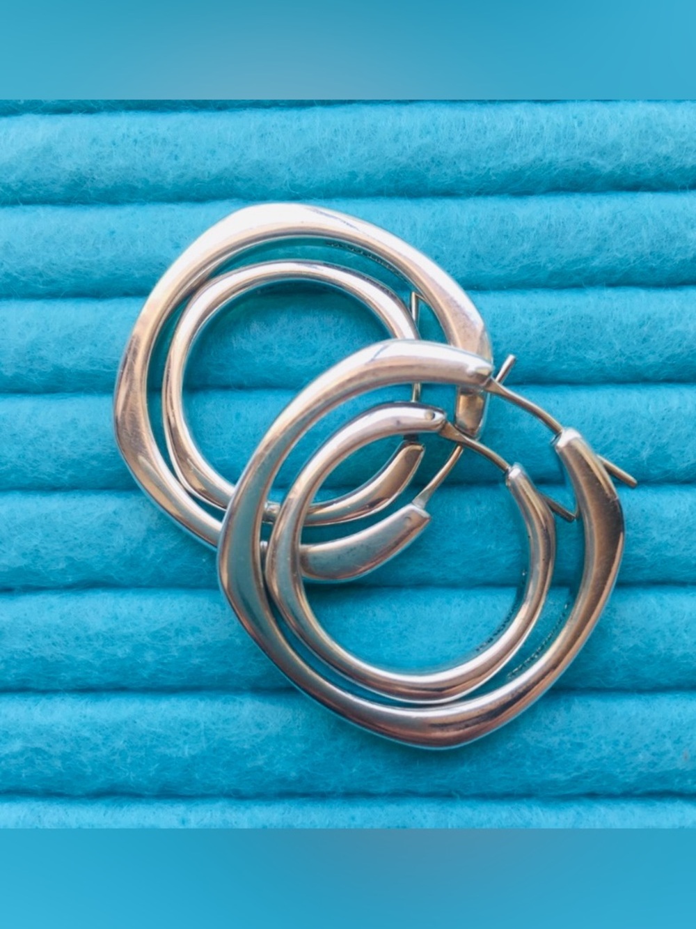 Tiffany & Co. 2 Sets of Cushion earrings.